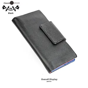 Detailed view of long black pebble leather wallet featuring colorful interior compartments