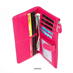 Detail of rose red leather wallet featuring multiple card slots and a zipper pocket
