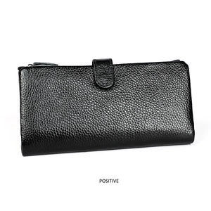 Close-up of black RFID leather wallet with litchi texture and metal zipper detail