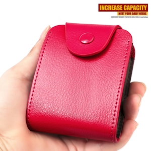 Detail view of red RFID leather card holder with textured finish and snap closure