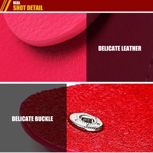 Macro detail of red leather texture and ornate metallic magnetic clasp component
