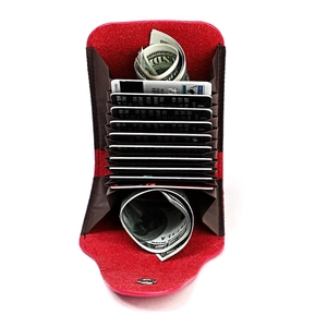 Red genuine leather accordion card holder with multiple slots and vertical storage capacity