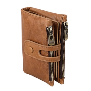 Detailed macro view of the brown leather wallet showing stitching and double zippers
