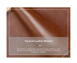Close-up of brown genuine cowhide leather texture with precision stitching on wallet