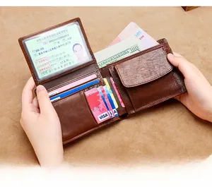 Detailed view of the dark brown leather wallet interior with card slots and coin pocket