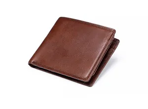 Close-up of brown genuine leather wallet showing natural texture and stitching details