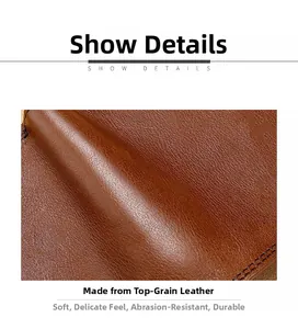 Close-up of premium cowhide leather texture showing natural grain and soft finish