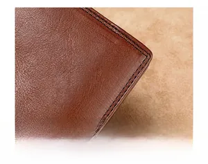 Detailed macro view of high-quality double stitching on the genuine leather wallet