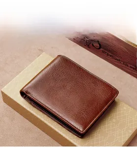Close-up of coffee brown leather wallet with natural grain texture and neat stitching