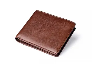 Close-up of genuine brown leather wallet showing fine texture and meticulous hand-stitching