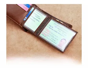 Close-up of a brown genuine leather wallet with multiple card slots and clear ID window