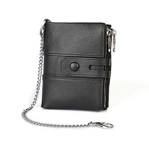 Close-up of black oil-waxed leather RFID wallet with silver metal anti-theft chain detail