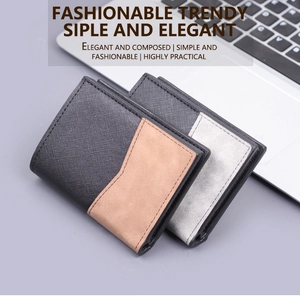 Detailed view of slim cross-grain leather bifold wallets on a professional office desk