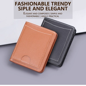 Detail of ultra-slim brown and black leather card holders with contrast stitching
