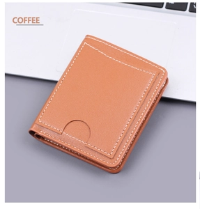 Detailed view of coffee brown vertical leather wallet with white stitching and card slot