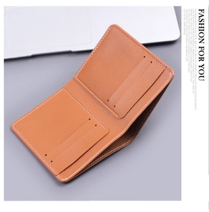 Internal view of brown litchi leather wallet showing multiple card slots and white stitching