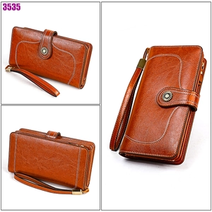 Portefeuille long en cuir marron foncé avec boucle tournesol et dragonne de transport