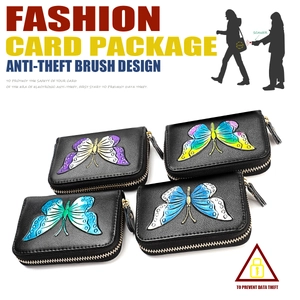 Detail view of colorful embossed butterfly leather card holders with RFID blocking technology