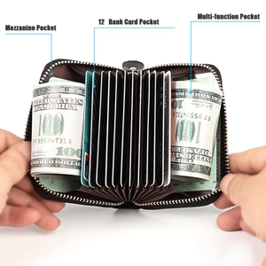 Interior detail of leather accordion wallet showing 12 card slots and large bill pockets