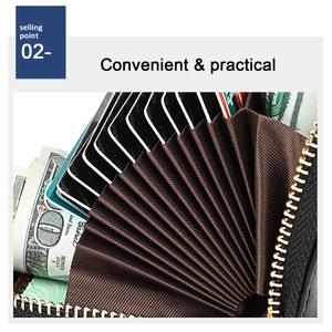 Detailed macro view of the accordion credit card slots and gold zipper closure