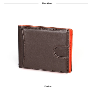 Detail view of brown leather wallet with orange lining and premium stitching