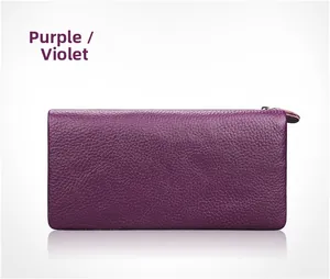 Detail of violet pebble grain leather wallet with high-quality zipper and sleek finish