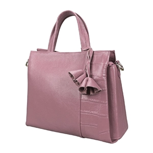 Detail of dusty pink leather tote with lychee texture and crocodile pattern side panels