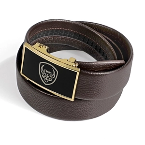 Detailed view of brown genuine leather belt with golden automatic buckle and bull logo