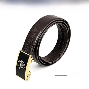 Detail of coffee leather belt with top layer cowhide texture and golden automatic buckle