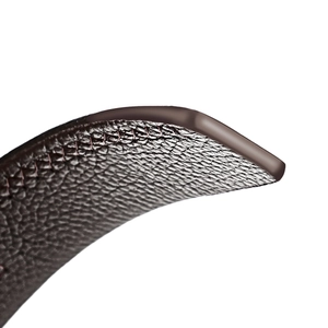 Close-up of brown lychee grain genuine leather belt with durable edge oil finish