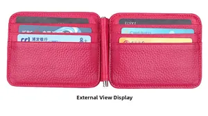 Detail view of pink pebbled leather wallet interior with card slots and silver money clip