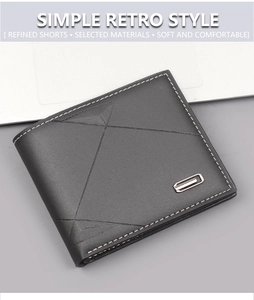 Detail of black bifold leather wallet with geometric texture and white stitching details