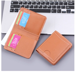 Detail view of brown leather wallet interior showing multiple card slots and cash pocket