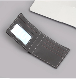 Detail view of men's bifold wallet showing card slots and transparent ID window