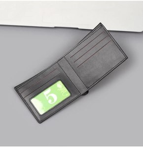 Interior detail of men's slim bi-fold leather wallet showing card slots and ID window