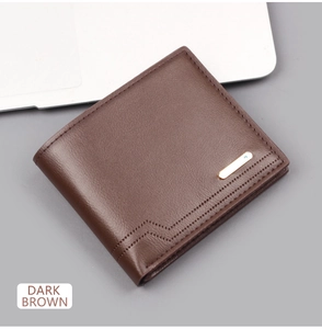 Close-up of dark brown bifold wallet with wavy stitching and gold metal detail