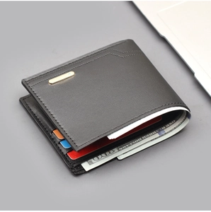 Detail view of black leather bifold wallet for men showing card slots and cash pocket