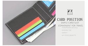 Detail showing simple card slots and bill compartment in a black leather bifold wallet