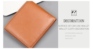 Close-up of brown leather wallet showing precision stitching and pebble grain texture