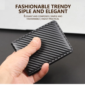 Detailed close-up of slim carbon fiber men's driver license holder with fine stitching