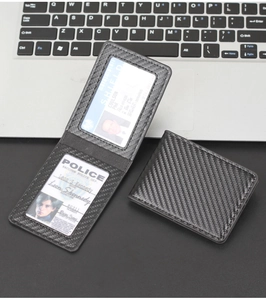 Detail of carbon fiber driver license wallet with transparent ID card slots