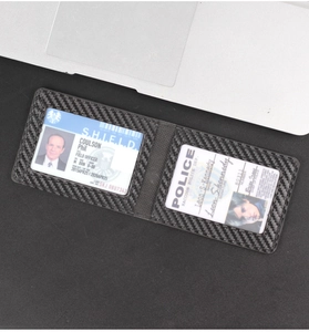 Detail view of carbon fiber texture wallet with dual transparent PVC ID card slots