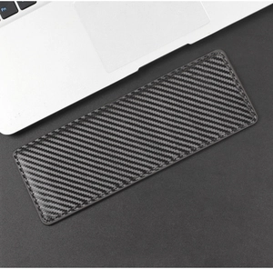 Detail of black carbon fiber driver license holder with reinforced edge stitching