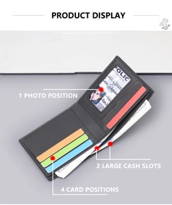 Detail view of black men's wallet with 4 card slots, photo ID window and 2 bill compartments