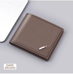 Detail of dark brown leather wallet showing fine stitching and metallic logo accent
