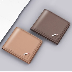 Short bifold men's leather wallet detail showing tan and dark brown matte finish