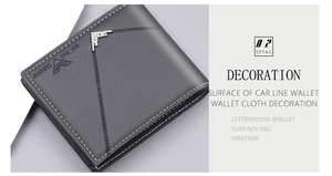 Detalle de cartera de cuero negro con costuras blancas y protector de esquina plateado