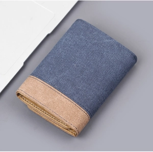 Top view of tri-fold navy and khaki canvas wallet with contrast stitching