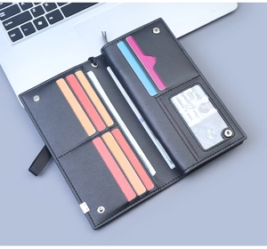 Internal detail of a black leather business wallet showing multiple colorful card slots