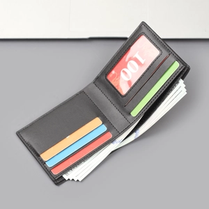 Men's slim bifold black leather wallet featuring multiple card slots and an ID window